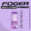 Blackberry blueberry Switch Pro pod by Foger with a clear 19mL tank snapped onto the magnetic power bank dock