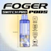 Blackberry passion refresher pod by Foger with a clear 19mL tank next to the magnetic Switch Pro charging dock