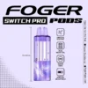 Frozen blackberry Switch Pro pod by Foger with a clear 19mL tank seated in the magnetic charging dock