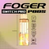 Frozen orange green pod by Foger with sweet orange and green apple flavor, clear 19mL tank docked in the Switch Pro power bank