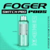 Miami mint Switch Pro pod clicked into the magnetic charging dock, clear 19mL tank showing the e-liquid level