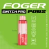 Red velvet cupcake pod by Foger clicked into the Switch Pro magnetic dock, clear 19mL tank showing the e-liquid level