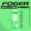Sour punch Switch Pro pod by Foger showing the clear 19mL tank seated in the magnetic charging dock