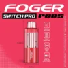 Strawberry cupcake Switch Pro pod by Foger with a clear 19mL tank clicked into the magnetic charging dock