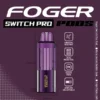 Watermelon bubble gum pod for the Foger Switch Pro with a clear 19mL tank clicked into the magnetic charging dock